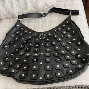 YSL handbag with bead fixtures.